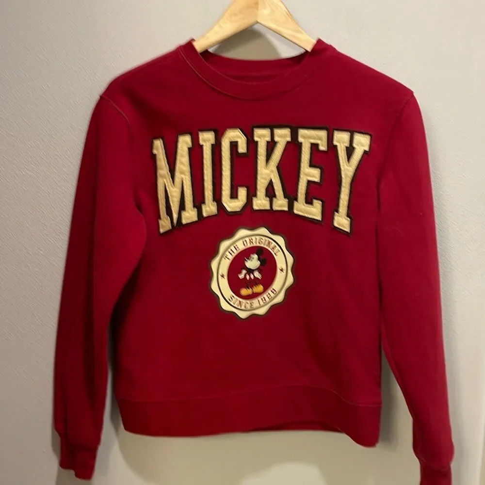 NWOT Disney woman’s red Mickey Mouse sweatshirt